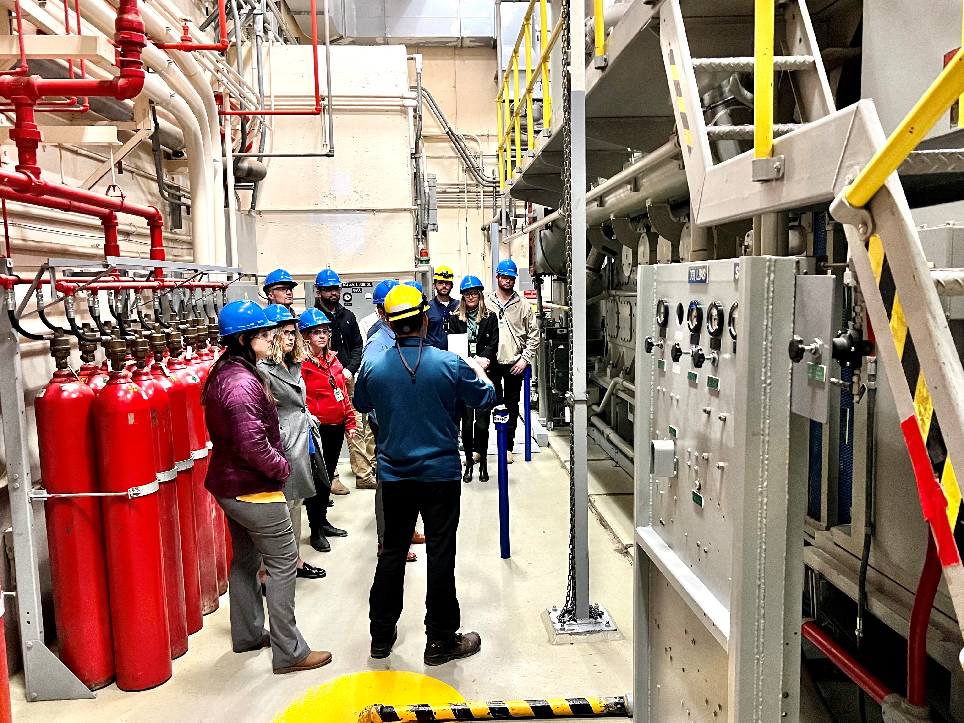 NPPD teammates shows LEAD participants the emergency diesel generators at Cooper Nuclear Station.