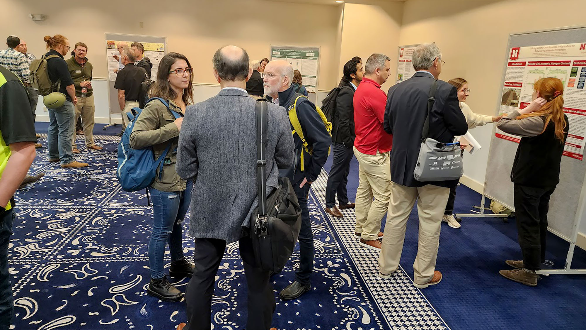 Participants in the first-ever Great Plains Biochar Conference attend the poster session. The conference was held Sept. 24 to 26 in Lincoln.