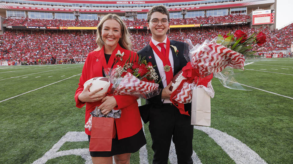 Seniors Emmerson Putnam (left) and Jamie Smith were crowned homecoming royalty during halftime of the Nebraska-Rutgers football game Oct. 5. [Craig Chandler | University Communication and Marketing]