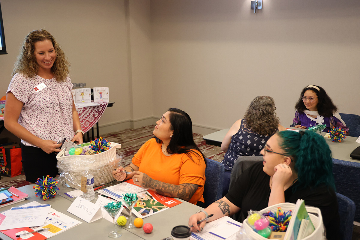 Extension Educator Jaci Foged (left) engages with Head Start participants during a recent CHIME Facilitator program.