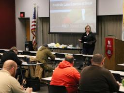 Extension Educator Sarah Browning presenting at a commercial/noncommerical pesticide training class.