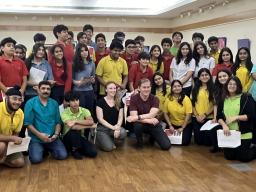 Ann Marie Pollard and Hank Stratton (front row, center) with students at Shri Ram School-Moulsari campus in Gurugram (Delhi), India. Pollard and Stratton co-led a workshop for high school theatre students dramatizing Amanda Gorman’s “The Hill We Climb.”