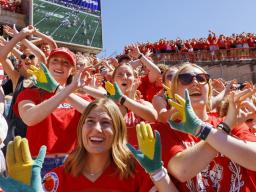 A group in the student section show off their "corn hands". Nebraska football game vs UTEP. August 31, 2024. Photo by Craig Chandler / University Communication and Marketing.