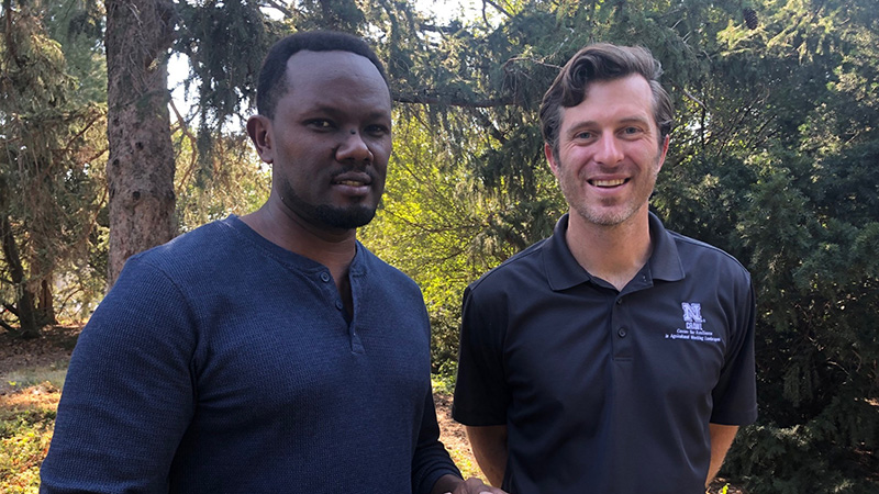 Samuel Nshutiyayesu (on left), a doctoral candidate in Agronomy, and Daniel Uden (on right), a professor in range and forage sciences in the School of Natural Resources. 