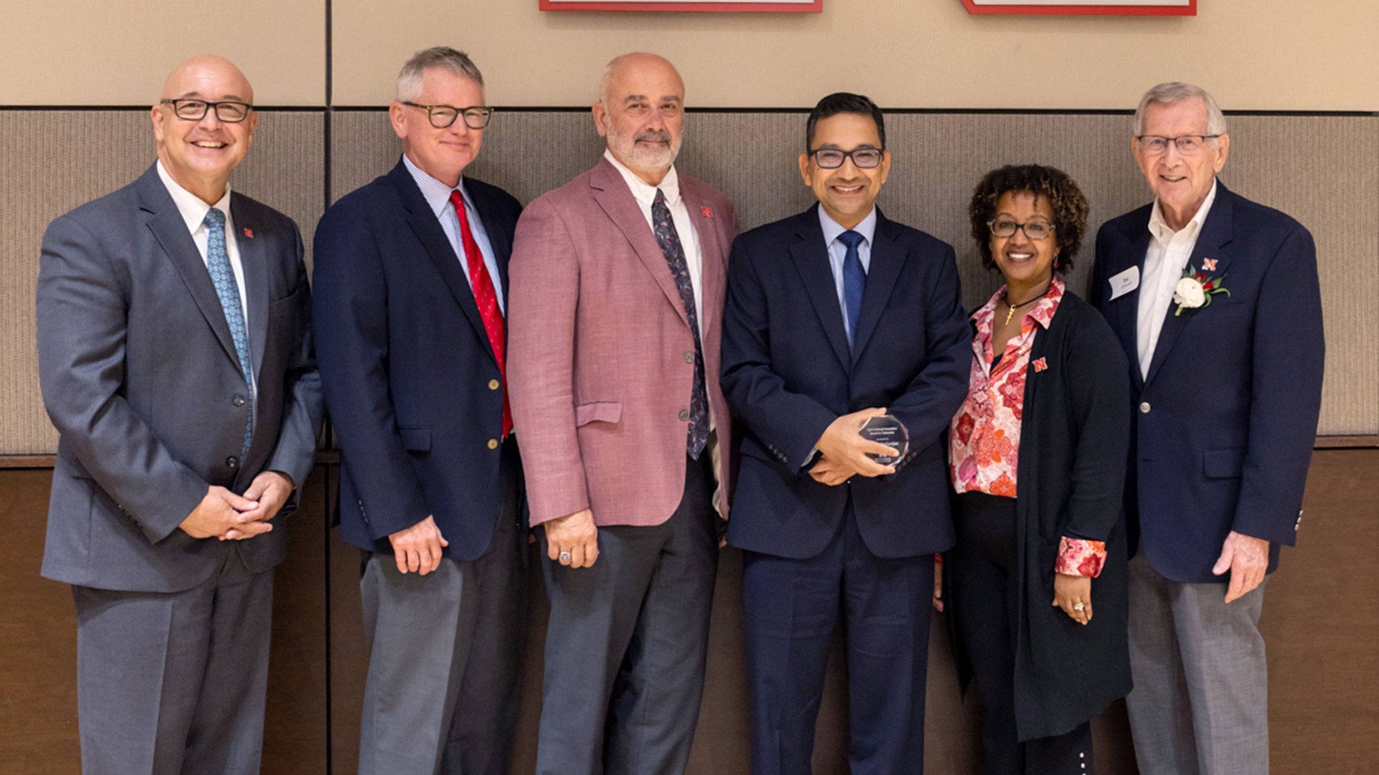 Bijesh Maharjan, Nebraska Extension Soil Management Specialist received the Omtvedt Innovation Award. Pictured, from left, is Mike Boehm, John Westra, Charlie Stoltenow, Maharjan, Martha Mamo and Irvin Omtvedt.