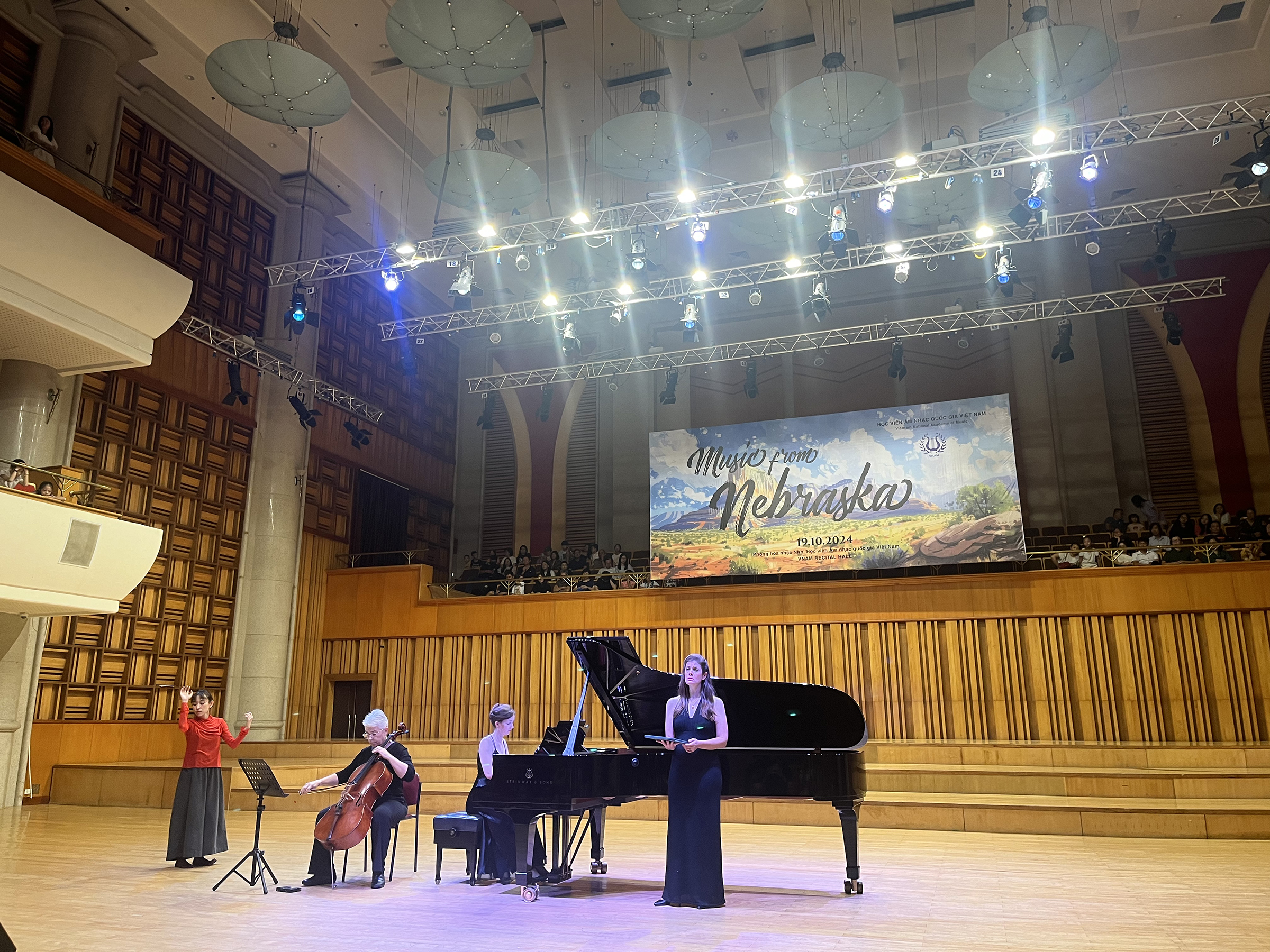 Dance alumna Dieu Thao Duong, Professor of Cello Karen Becker, Music alumna Madeline Rogers and Assistant Professor of Voice Suna Gunther perform at the Vietnam National Academy of Music on Oct. 19. Courtesy photo.