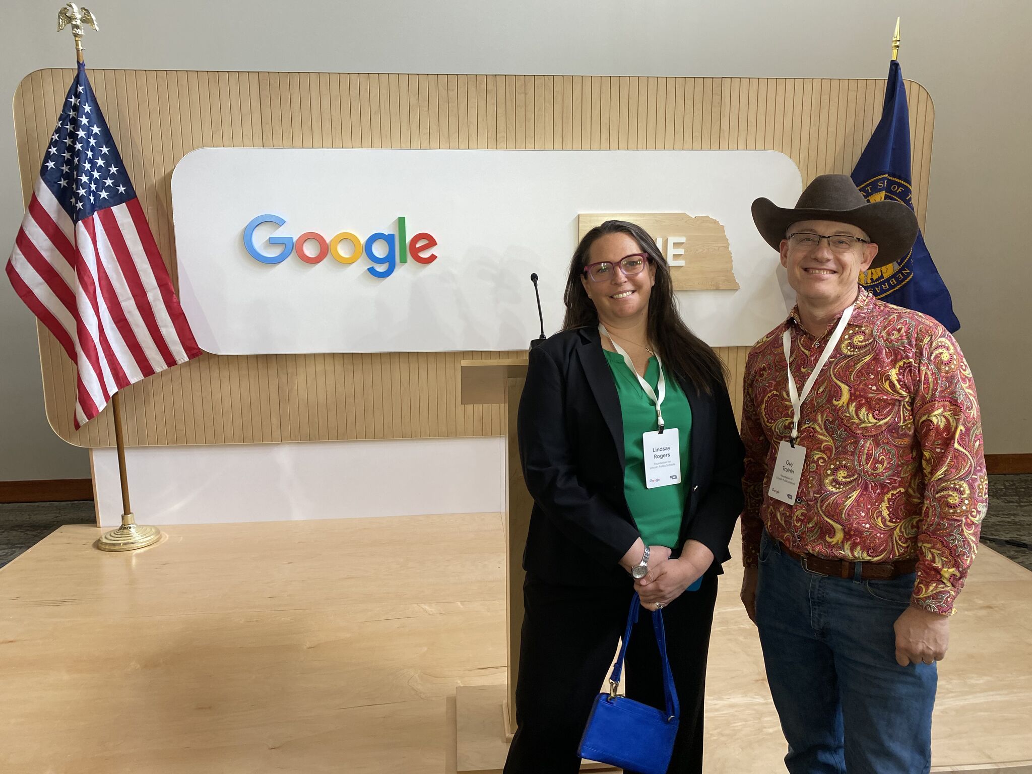 Lindsay Rogers, Spark Lincoln Learning program director, and Guy Trainin, UNL faculty member and Spark board member, attend the news conference announcing Google's donation.