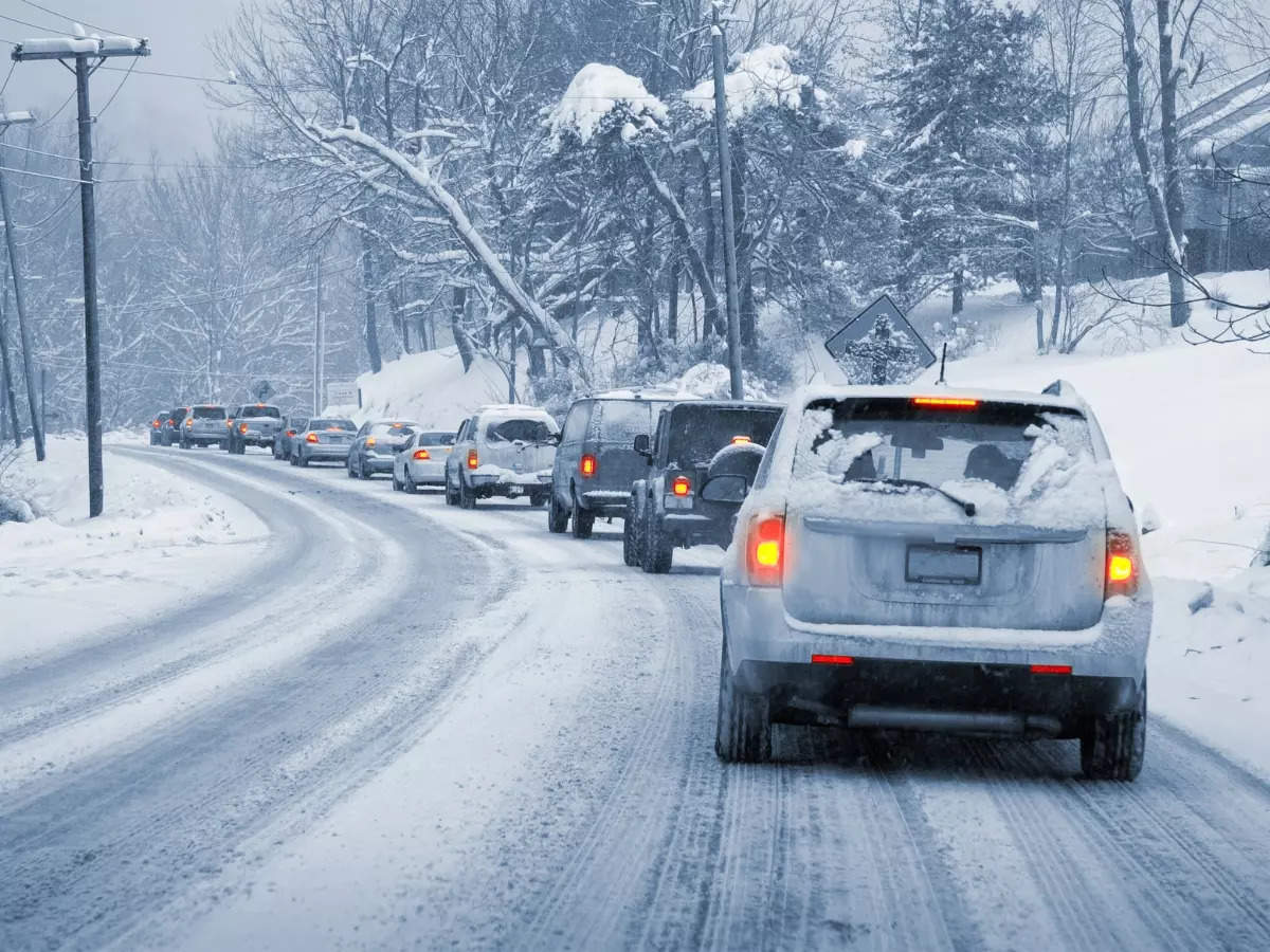 Cars driving on snowy roads in the winter