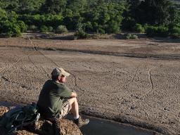 John Carroll enjoys a quiet moment overlooking the Motloutse River in the Northern Tuli Game Reserve, Botswana. He has hosted study abroad trips to Botswana and South Africa almost every year since 2000.