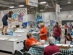 4-H volunteers helping with static exhibits at the 2024 Lancaster County Super Fair