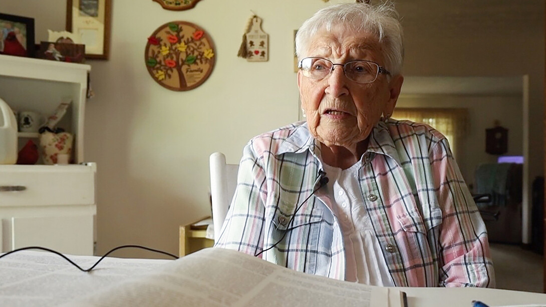 Delberta Peterson of Niobrara, NE, shares the story of crossing the Niobrara River on a rickety drawbridge during the 1952 floods.  Photo by Harley Stark 