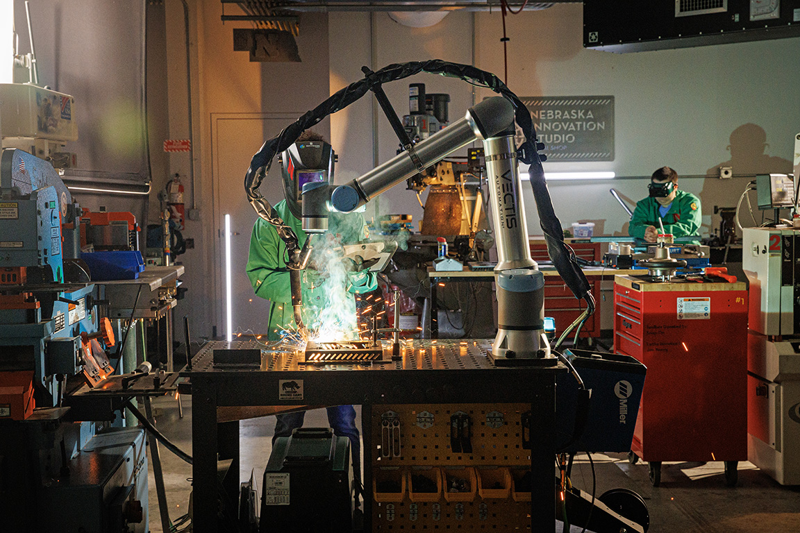 Behind the scenes photo of the Nebraska Innovation Studios welding robot on June 25, 2024. Photo by Kristen Labadie / University Communication.