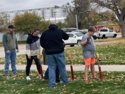 Teaching the basics of archery.