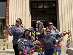 Advisors in front of Burnett Hall