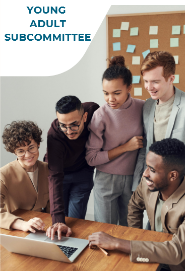 Picture of five people standing around a computer looking at the screen