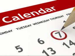 Calendar with pencil circling a date. 