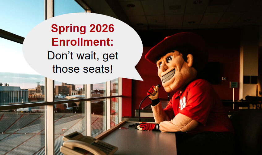 Herbie Husker practices his play-by-play skills to encourage students to enroll for spring 2026 semester as seats are filling quickly.