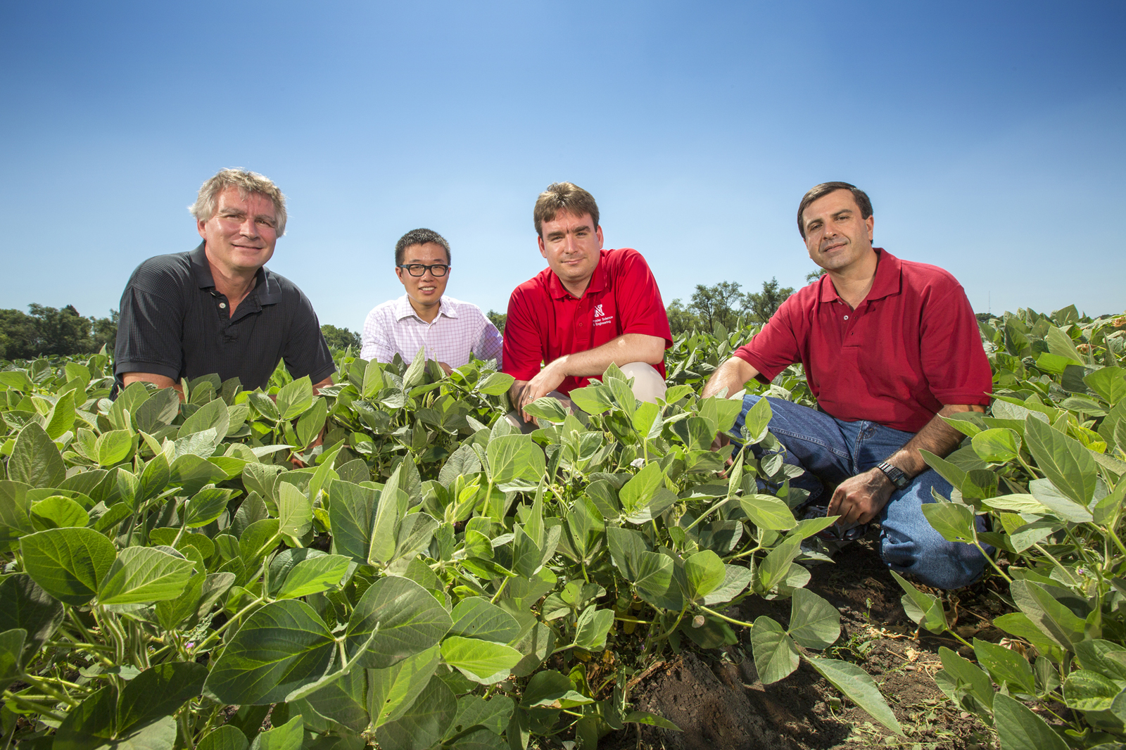 Stephen Reichenbach (from left), Xin Dong, Mehmet Can Vuran and Suat Irmak are working on a project to develop wireless underground sensor networks to give agricultural producers real-time information about soil moisture and changing conditions that would