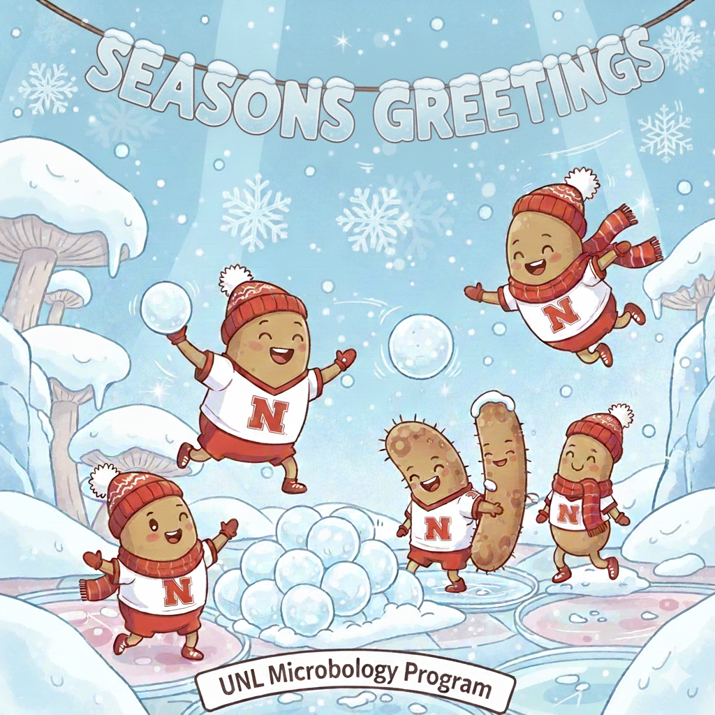 Microbes having a snowball fight wearing N sweaters with Seasons Greetings message.