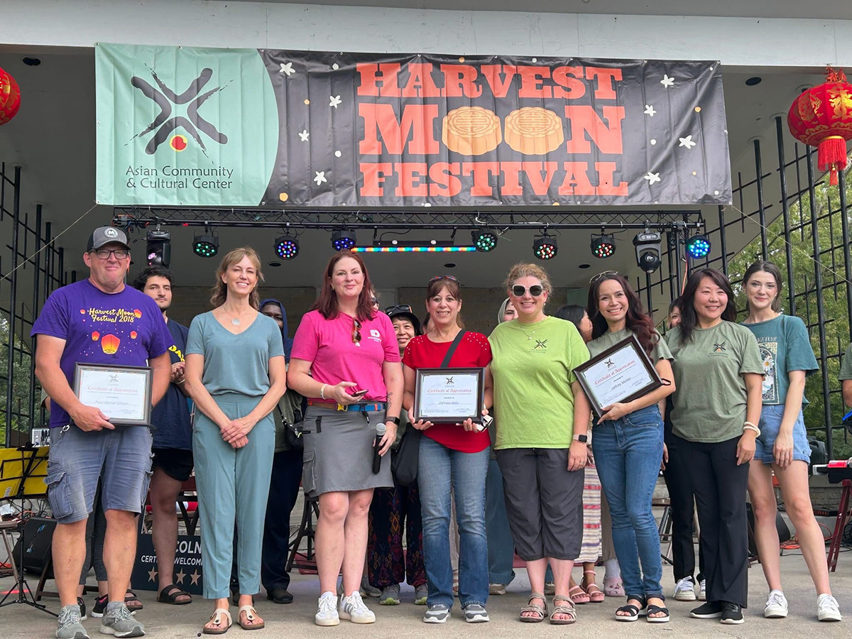 Pictured front L&ndash;R: Paul Vinton, Lincoln Mayor Leirion Gaylor Baird, ACCC staffer Lisa Guill, Extension Assistant Zahraa Rida, ACCC staffer Sheila Dorsey Vinton, ACCC staffer Thuy Ngoc Ho, ACCC staffer Rebecca Reinhardt and ACCC staffer Alina Pestushko.