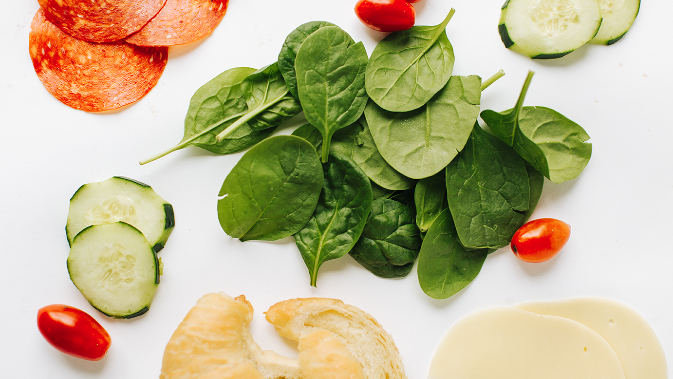 Customize a sandwich with fresh ingredients at Husker Heroes.