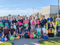 At the October 4-H Teen Council club meeting, members compiled comfort kits to donate to the BraveBe Child Advocacy Center. Not all Teen Council members are pictured.