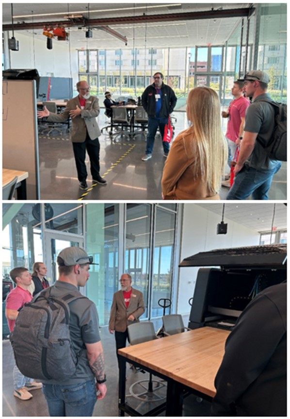 Dr. Mark Riley describes a new laser cutter for processing of thick metal sheets. The next day this equipment was lowered by crane into the basement of the Design Hub in the College of Engineering.