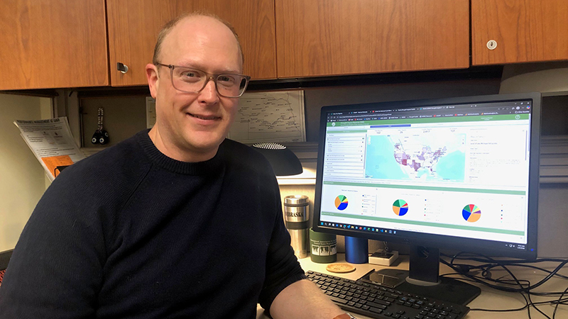 Ian Ratcliffe, a specialist in geographic information systems at the University of Nebraska–Lincoln, works on the Drought Impacts Toolkit webpage of the National Drought Mitigation Center.