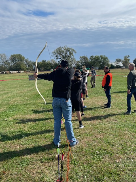 Teaching basic firearm and archery handling and safety.