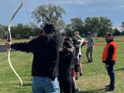 Teaching basic firearm and archery handling and safety.