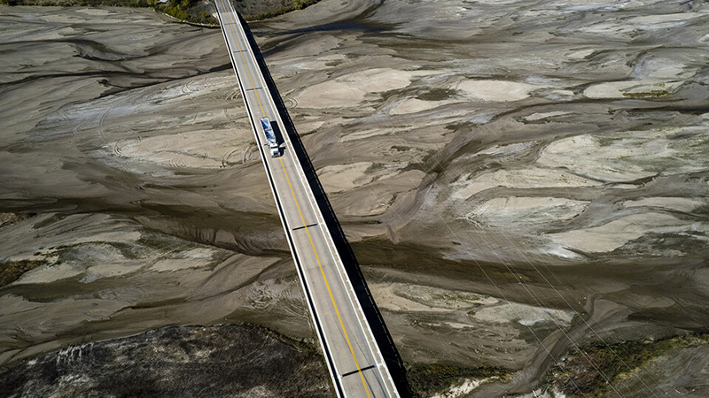 A grain truck crosses the dry Platte River near Chapman, Nebraska, in October 2023. At the time, the U.S. Drought Monitor reported that the area around Chapman was in severe/extreme drought.