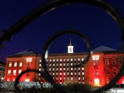 Love Library South is illuminated in red on Feb. 12, 2025, in honor of Glow Big Red &mdash; 24 Hours of Husker Giving.