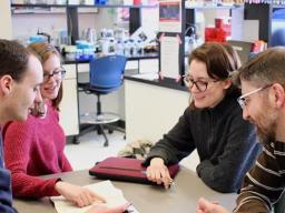 Writing Fellows talking with a faculty partner