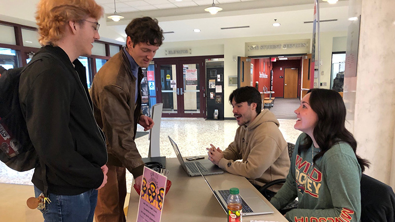 Charlie Krug and Sophia Rojas, student ambassadors, answer other students&rsquo; questions in the School of Natural Resources.