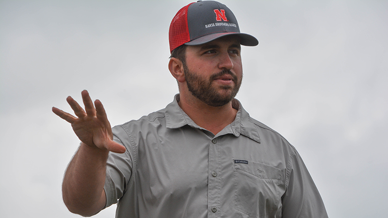 Jacob Harvey, a research project coordinator at Barta Brothers Ranch, speaks during a field day on the ranch July 16, 2025. Photo credit: Deloris Pittman.