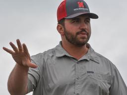 Jacob Harvey, a research project coordinator at Barta Brothers Ranch, speaks during a field day on the ranch July 16, 2025.