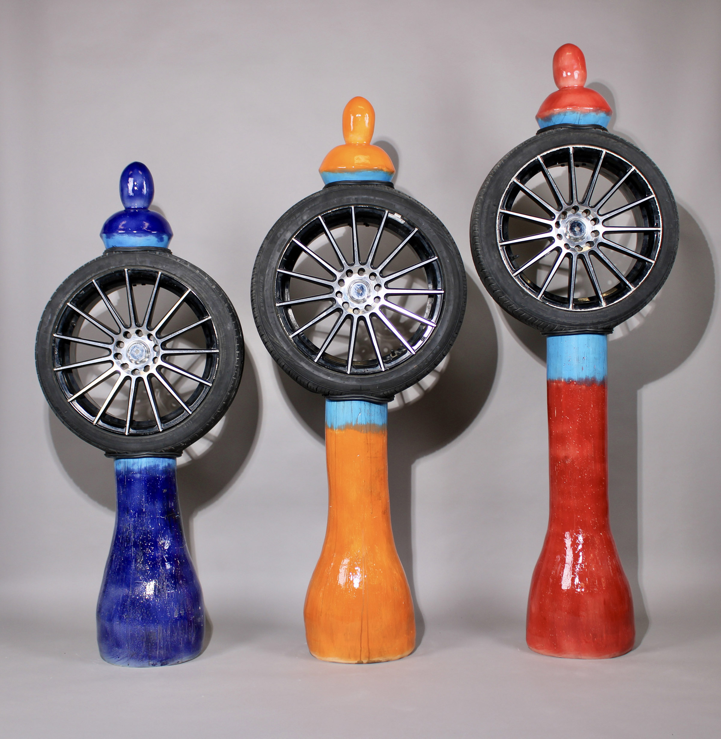 Emmanuel Asamoah, “Ahintasem” (Hidden), 2026. Earthenware, car tire, window molding, glaze. 84” x 72” x 107”.