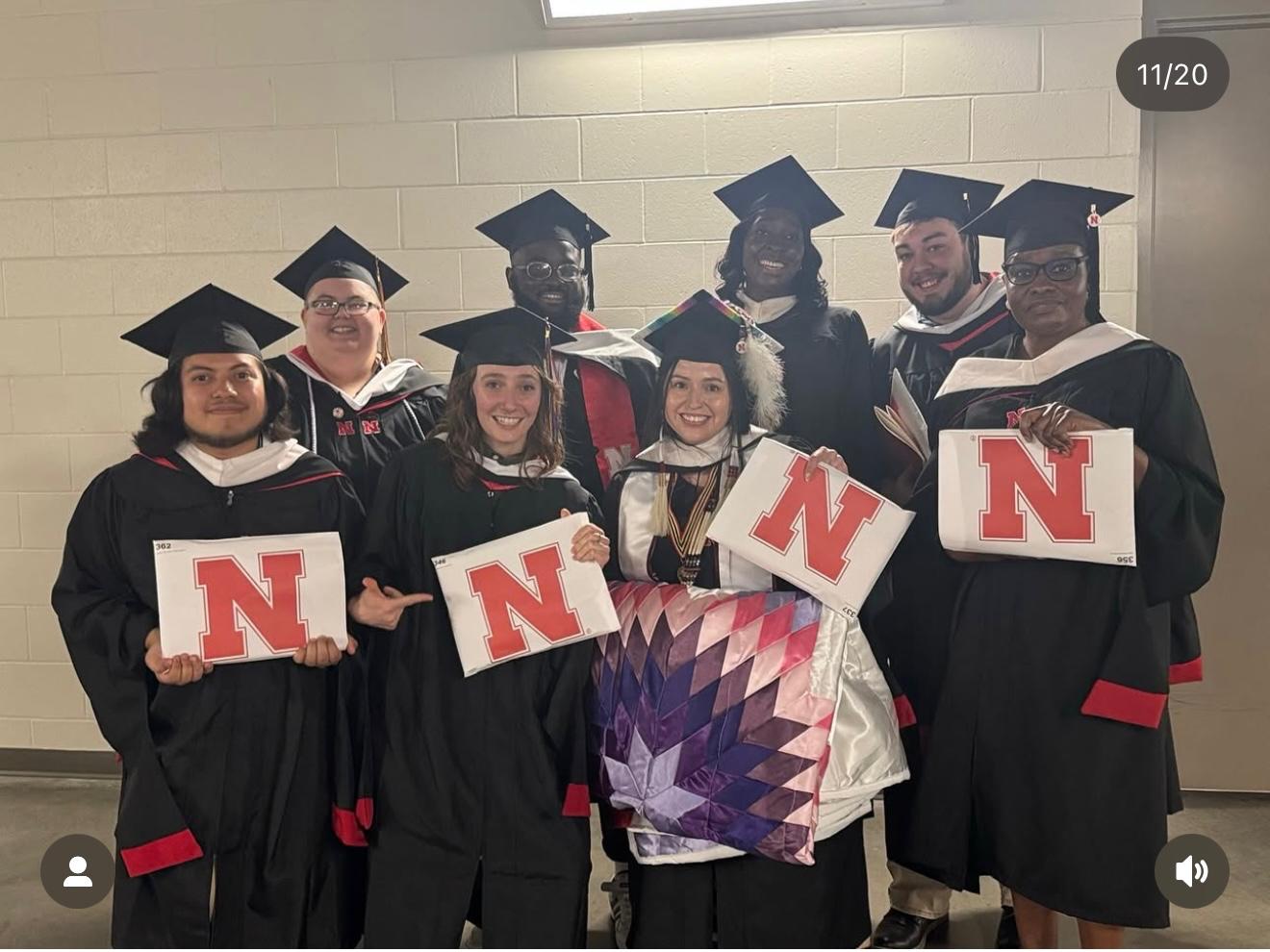 Students receiving diplomas at commencement