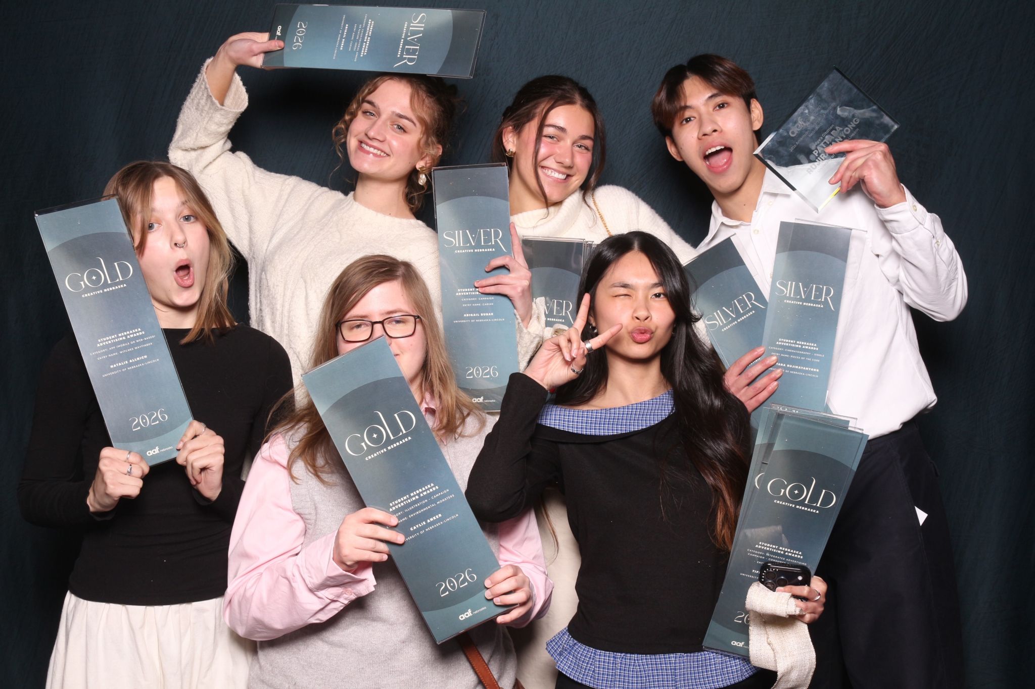 School of Art, Art History & Design graphic design students celebrate winning Addy Awards at the Creative Nebraska Awards. Clockwise from upper left: Abigail Bubak, Clare Clark, Pattara Rujirayanyong, Tiffany Nguyen, Caylie Anker and Natalie Allrich.