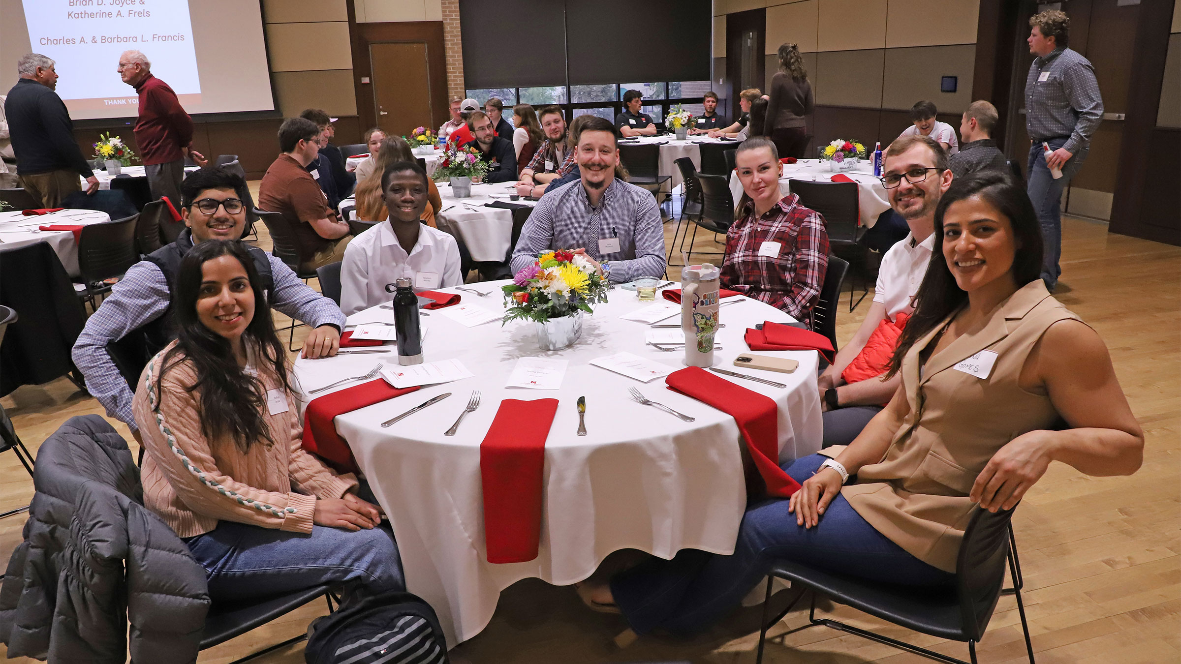 Agronomy and Horticulture graduate students gather at one of the tables during the 2025 Spring Banquet. Department student organizations coordinate this annual event.