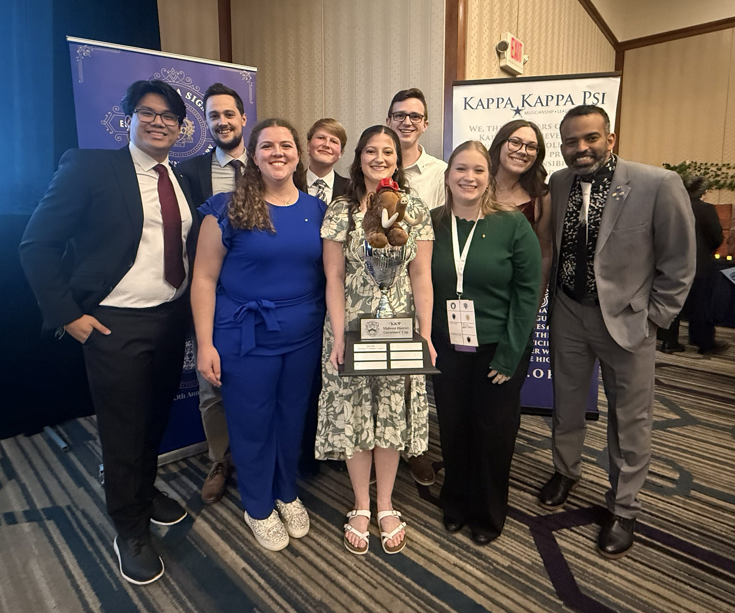 Left to right: Viet Nguyen (KKPsi Governor), Brandon Urkoski, Katy Taylor, Devin Tubbs, Megan Wilderman, Nick Mowery, Ellie Hoegemeyer, Paige Germer and Kerry Anthony Walker (KKPsi Governor). Courtesy photo.