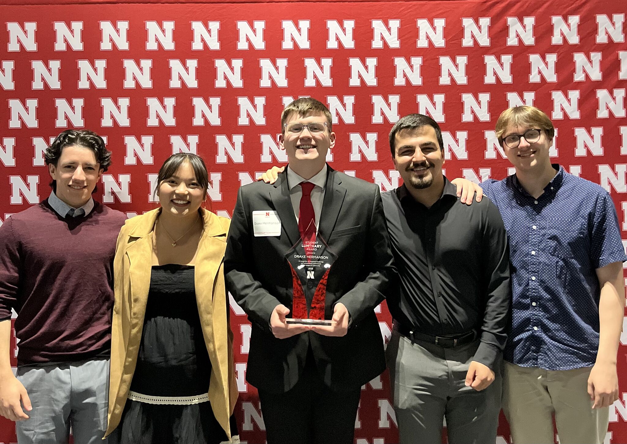Drake Hermanson with his Student Luminary Award at the awards reception on April 17 with Rowan Havranek, Sam Hoover, Ahmed Mahdi, and Cole Walters. Photo courtesy of Drake Hermanson.