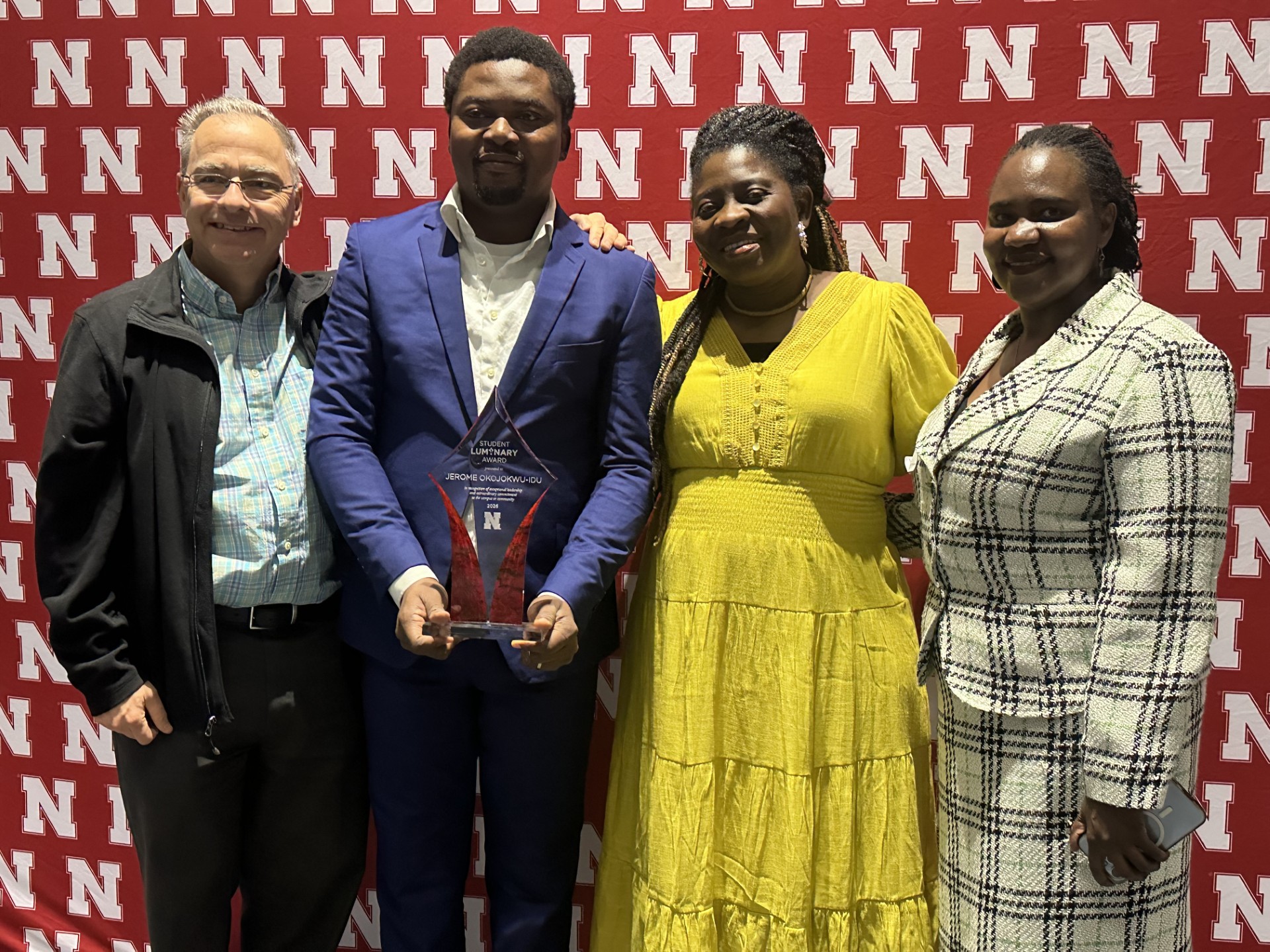 (left to right) Dr. Michael Hayes, Jerome Okojokwu-Idu, Margaret Nongo-Okojokwu, and Dr. Lydiah Kiramba