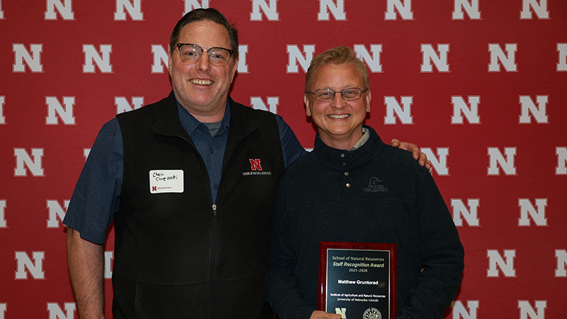 Matt Gruntorad (on right) received the staff recognition award at the SNR banquet.  Chris Chizinski (on left) is Gruntorad's supervisor.  Photo courtesy of Marissa Lindemann.