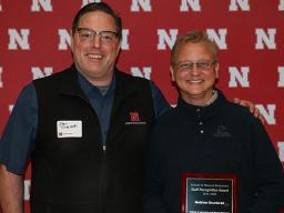 Matt Gruntorad (on right) received the staff recognition award at the SNR banquet.  Chris Chizinski (on left) is Gruntorad's supervisor. 