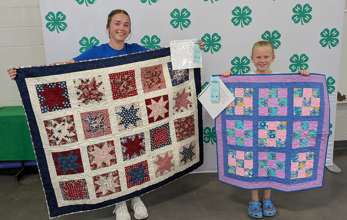 Two 4-H Quilt Quest quilted exhibits at the 2025 Lancaster County Super Fair
