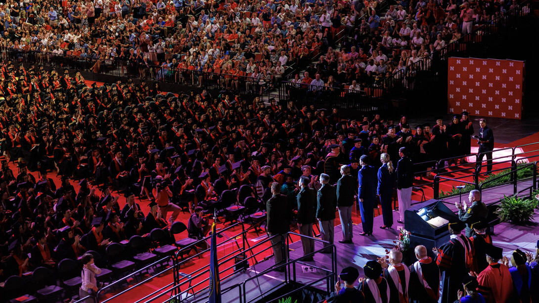 Members of the University of Nebraska–Lincoln’s Reserve Officer Training Corps receive applause after reciting the oath of enlistment during the morning undergraduate commencement ceremony May 9 at Pinnacle Bank Arena.