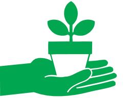 Green hand holding a small pot with a plant.