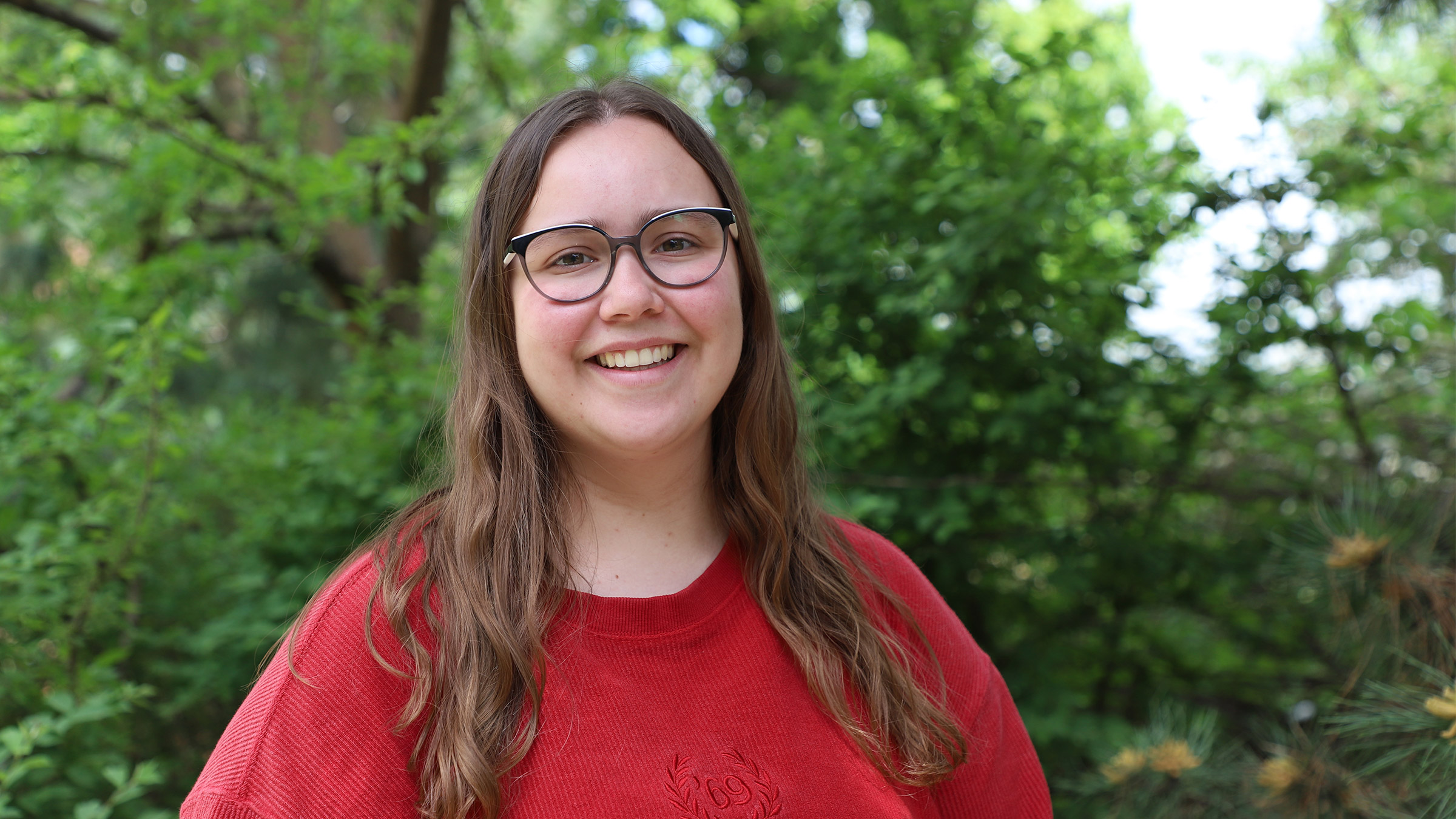 After finishing her final exam to graduate, Remi Christensen relaxes on the university's East Campus. Fran tenBensel Benne | Agronomy and Horticulture 