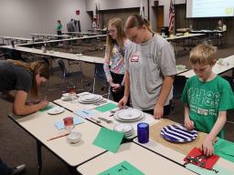 Lancaster County 4-H'ers setting Table Setting place settings at the 2025 4-H Life Challenge Contest